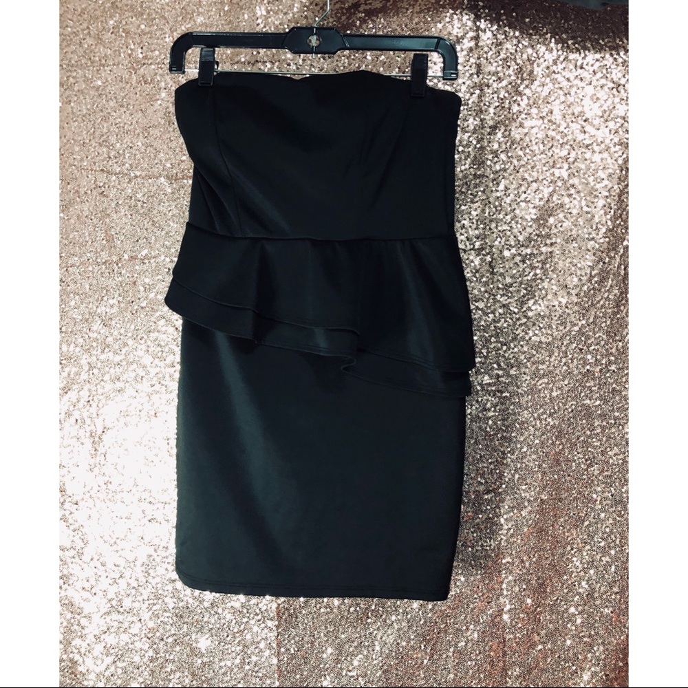 Asymmetric black dress.